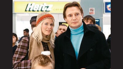 The opening scene of Love Actually (2003) is set at Heathrow’s arrival area, and features Liam Neeson and Claudia Schiffer (below) welcoming loved ones. It’s a far cry from Heathrow of today. The opening scene of Love Actually (2003) is set at Heathrow’s arrival area, and features Liam Neeson and Claudia Schiffer (below) welcoming loved ones. It’s a far cry from Heathrow of today.
