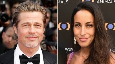 Brad Pitt Sends Ines de Ramon Pink Peonies for Valentine’s Day (Kurt Krieger/Corbis via Getty; Alberto E. Rodriguez/Getty)