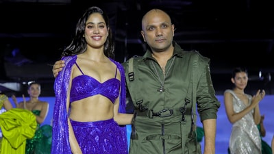 Janhvi Kapoor was later joined by fashion designer Gaurav Gupta after turning showstopper for him at the India Couture Week 2023 in New Delhi. She wore her dupatta as a cape with her lehenga. (PTI) Janhvi Kapoor was later joined by fashion designer Gaurav Gupta after turning showstopper for him at the India Couture Week 2023 in New Delhi. She wore her dupatta as a cape with her lehenga. (PTI)