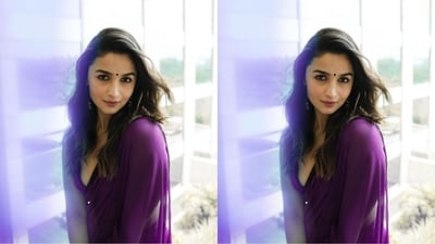 For her look, Alia wore yet another Manish Malhotra chiffon saree in purple colour. She paired it with a matching sleeveless blouse featuring deep plunging neckline. (Instagram/@aliaabhatt) For her look, Alia wore yet another Manish Malhotra chiffon saree in purple colour. She paired it with a matching sleeveless blouse featuring deep plunging neckline. (Instagram/@aliaabhatt)