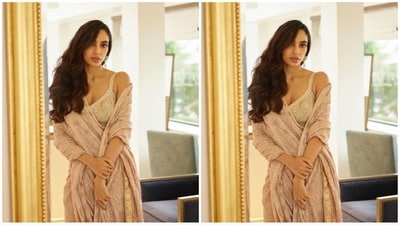 Her saree comes in an ombre shade and features tissue georgette fabric which is embroidered with chikankari jali shadow and maroori work enhanced with mukaish. (Instagram/@sobhitad) Her saree comes in an ombre shade and features tissue georgette fabric which is embroidered with chikankari jali shadow and maroori work enhanced with mukaish. (Instagram/@sobhitad)