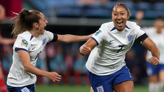 England's Lauren James, right, celebrates a first half goal with teammate England's Ella Toone during the Women's World Cup Group D match (AP)