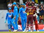 Shai Hope and Keacy Carty celebrate as Shubman Gill and Suryakumar Yadav of walk off the field at the end of the 2nd ODI between West Indies and India at Kensington Oval in Barbados