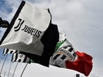 General view of Juventus flags seen outside the stadium before the match