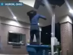 Policy body cam records failed bank robber crashing through ceiling, getting trapped in recycling bin in Huron, Ohio. Policy body cam records failed bank robber crashing through ceiling, getting trapped in recycling bin in Huron, Ohio.