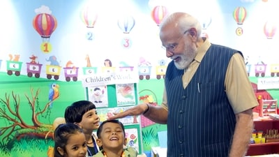 Prime Minister Narendra Modi interacts with children at an exhibition during Akhil Bharatiya Shiksha Samagam, at Bharat Mandapam in New Delhi on Saturday. Prime Minister Narendra Modi interacts with children at an exhibition during Akhil Bharatiya Shiksha Samagam, at Bharat Mandapam in New Delhi on Saturday.