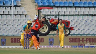 A batsman in action during the Sher-e-Punjab semifinal game between BLV Blasters and Trident Stallions at the IS Bindra PCA Stadium in Mohali. (HT Photo)