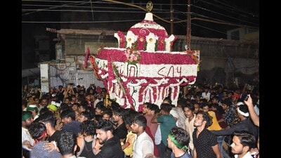 A tazia decorated with flowers being taken out in old city area of Prayagraj. (Anil Kumar Maurya/HT)
