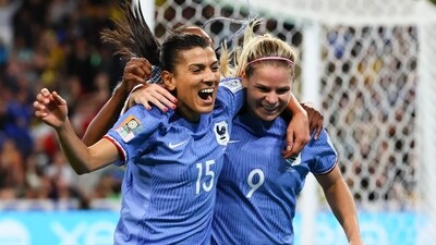 France's Eugenie Le Sommer, right, is congratulated by teammate Kenza Dali after scoring their first goal during the Women's World Cup Group F soccer match against Brazil (AP) France's Eugenie Le Sommer, right, is congratulated by teammate Kenza Dali after scoring their first goal during the Women's World Cup Group F soccer match against Brazil (AP)