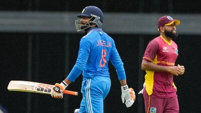 India's Ravindra Jadeja leaves the field after he was caught by West Indies' Yannic Cariah (AP) India's Ravindra Jadeja leaves the field after he was caught by West Indies' Yannic Cariah (AP)