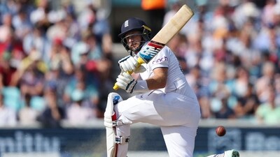 England's Joe Root plays a shot on day three of the fifth Ashes Test (AFP)