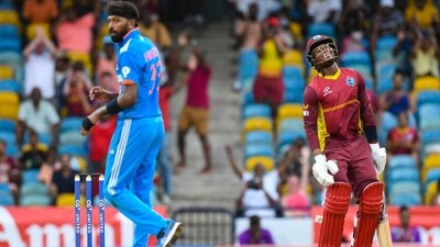 Keacy Carty and Hardik Pandya in action during the 2nd ODI between West Indies and India in Barbados (AFP) Keacy Carty and Hardik Pandya in action during the 2nd ODI between West Indies and India in Barbados (AFP)