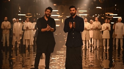 Ranbir Kapoor on Friday flaunted his desi side in a fusion outfit as he turned showstopper for designer Kunal Rawal at the India Couture Week 2023. (AFP) Ranbir Kapoor on Friday flaunted his desi side in a fusion outfit as he turned showstopper for designer Kunal Rawal at the India Couture Week 2023. (AFP)