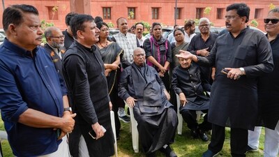 AAP MP Sanjay Singh with Leader of Opposition in Rajya Sabha Mallikarjun Kharge and other opposition MPs (PTI)