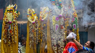 Muslim devotees during a procession on the tenth day of the mourning period of Muharram, in Hubballi, Saturday. (PTI) Muslim devotees during a procession on the tenth day of the mourning period of Muharram, in Hubballi, Saturday. (PTI)