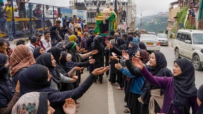 Female Muslim devotees participate in a procession on the tenth day of the mourning period of Muharram, in Shimla. (PTI) Female Muslim devotees participate in a procession on the tenth day of the mourning period of Muharram, in Shimla. (PTI)