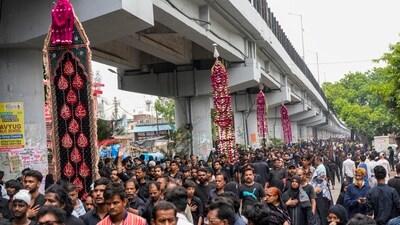 Shia Muslims mourn during a Muharram procession on the day of 'Ashura', in Lucknow. (PTI) Shia Muslims mourn during a Muharram procession on the day of 'Ashura', in Lucknow. (PTI)