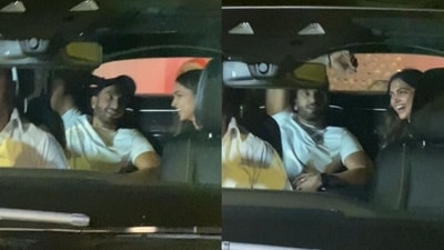 Ranveer Singh and Deepika Padukone in their car. Ranveer Singh and Deepika Padukone in their car.