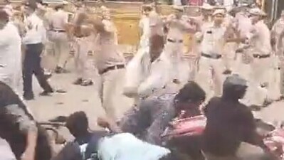 Videos show the crowd stone pelting and causing damage to vehicles. Videos show the crowd stone pelting and causing damage to vehicles.