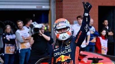 Red Bull Racing's Dutch driver Max Verstappen celebrates in the parc ferme after the qualifying session of the Formula One Belgian Grand Prix. (AFP) Red Bull Racing's Dutch driver Max Verstappen celebrates in the parc ferme after the qualifying session of the Formula One Belgian Grand Prix. (AFP)