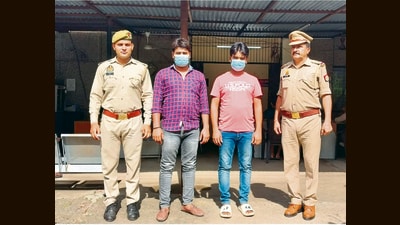 The suspect in police custody. (HT Photo) The suspect in police custody. (HT Photo)