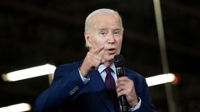 US President Joe Biden gestures as he speaks about his economic plan "Bidenomics" at Auburn Manufacturing Inc. in Auburn, Maine, (AFP)
