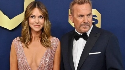 Christine Baumgartner and Kevin Costner (File) Christine Baumgartner and Kevin Costner (File)
