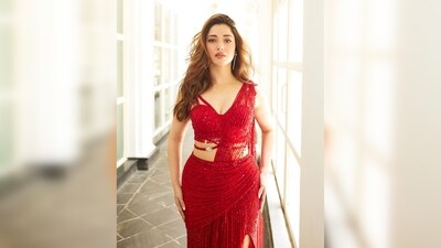Tamannaah Bhatia looked drop-dead gorgeous in this red contemporary saree-inspired contemporary gown. (Instagram/@tamannaahspeaks) Tamannaah Bhatia looked drop-dead gorgeous in this red contemporary saree-inspired contemporary gown. (Instagram/@tamannaahspeaks)