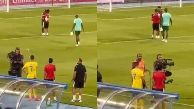 Cristiano Ronaldo throws water at a cameraperson. Cristiano Ronaldo throws water at a cameraperson.