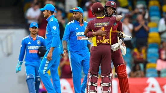Shai Hope and Keacy Carty celebrate as Shubman Gill and Suryakumar Yadav of walk off the field at the end of the 2nd ODI between West Indies and India at Kensington Oval in Barbados(AFP)