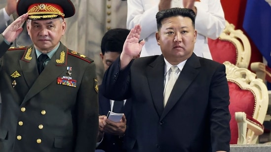 North Korean leader Kim Jong Un, right, and Russian Defense Minister Sergei Shoigu attend a military parade. (AP)