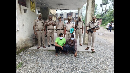 The accused, Sarabjit alias Sarfi ( wearing a cap) was serving his sentence when he was granted a 4-week parole leave from Central Jail, Gurdaspur, on July 14, 2015. (HT photo)
