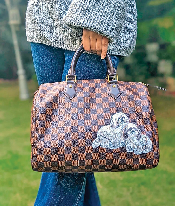 A bespoke bag, by My Artsy Custom, which features snaps of pets.