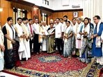 Opposition MPs with governor Anusuiya Uikey on Sunday. (PTI)