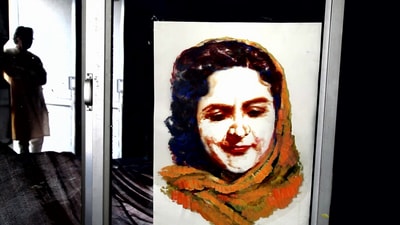 A painting of Amrita Pritam and the silhouette of painter Imroz in the background: An image from the film ‘Imroz’ by Harjit Singh (HT Photo) A painting of Amrita Pritam and the silhouette of painter Imroz in the background: An image from the film ‘Imroz’ by Harjit Singh (HT Photo)
