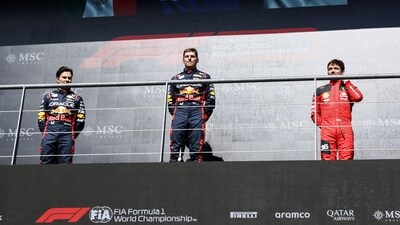 Winner Red Bull Racing's Dutch driver Max Verstappen (C), second-placed Red Bull Racing's Mexican driver Sergio Perez (L) and third-placed Ferrari's Monegasque driver Charles Leclerc (R) pose on the podium (AFP) Winner Red Bull Racing's Dutch driver Max Verstappen (C), second-placed Red Bull Racing's Mexican driver Sergio Perez (L) and third-placed Ferrari's Monegasque driver Charles Leclerc (R) pose on the podium (AFP)