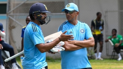 Rohit Sharma (L) and Rahul Dravid (R), of India, take part in a training session one day before the first ODI (AFP) Rohit Sharma (L) and Rahul Dravid (R), of India, take part in a training session one day before the first ODI (AFP)