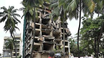 Mumbai, India - July 30, 2023 : This morning, half of Portion, a 12-storeyed Dev Sagar building, abandoned for about 45 years, came crashing down, due to which some parts of the compound wall broke. Fortunately no casualties have been reported at Carter Road, Bandra, in Mumbai, India, Sunday, July 30, 2023. (Photo by Vijay Bate/HT Photo) Mumbai, India - July 30, 2023 : This morning, half of Portion, a 12-storeyed Dev Sagar building, abandoned for about 45 years, came crashing down, due to which some parts of the compound wall broke. Fortunately no casualties have been reported at Carter Road, Bandra, in Mumbai, India, Sunday, July 30, 2023. (Photo by Vijay Bate/HT Photo)