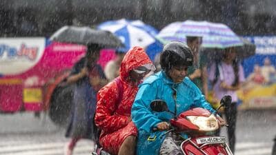 Mumbai, India - June 30, 2023: People going through the heavy rain at Parel in Mumbai, India, on Friday, June 30, 2023. (Photo by Satish Bate/ Hindustan Times) (Hindustan Times)