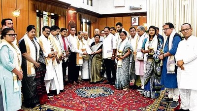 Opposition MPs with governor Anusuiya Uikey on Sunday. (PTI) Opposition MPs with governor Anusuiya Uikey on Sunday. (PTI)