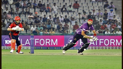 Players in action during the final of Sher-e-Punjab T20 cup at IS Bindra PCA Stadium in Mohali on Sunday. (Keshav Singh/HT) Players in action during the final of Sher-e-Punjab T20 cup at IS Bindra PCA Stadium in Mohali on Sunday. (Keshav Singh/HT)