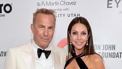 Kevin Costner and his estranged wife Christine Baumgartner (File) Kevin Costner and his estranged wife Christine Baumgartner (File)