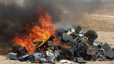 Saturday's bonfire saw hundreds of dollars worth of musical gear go up in smoke -- much of it collected from wedding halls in the city. (AFP)