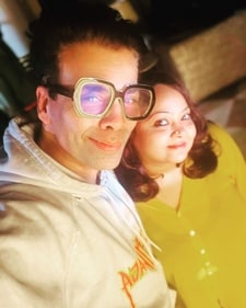 Ishita Moitra with Karan Johar in a photo.