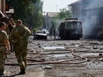Emergencies services members work at the site of a shelling in the course of Russia-Ukraine conflict in Donetsk,