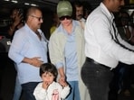 Kareena Kapoor and Saif Ali Khan with their sons at airport on Monday. (Pics; Varinder Chawla)