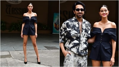 Ananya wore a black blazer featuring an off-the-shoulder neckline with a plunging slit accentuating her decolletage, half-length sleeves, front metal closures, patch pockets, a corseted design on the torso, a slit below the midriff, curved hem, and a figure-hugging silhouette. (HT Photo/Varinder Chawla) Ananya wore a black blazer featuring an off-the-shoulder neckline with a plunging slit accentuating her decolletage, half-length sleeves, front metal closures, patch pockets, a corseted design on the torso, a slit below the midriff, curved hem, and a figure-hugging silhouette. (HT Photo/Varinder Chawla)