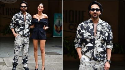 On the other hand, Ayushmann Khurrana complemented Ananya Panday in a monochrome tie-dye printed ensemble. He wore a tailored shirt featuring a hot air balloon print, white cloud patch embroidery, an open Mandarin collar neckline, zip closure, patch pockets, full-length sleeves with folded cuffs, and a form-fitting silhouette. (HT Photo/Varinder Chawla) On the other hand, Ayushmann Khurrana complemented Ananya Panday in a monochrome tie-dye printed ensemble. He wore a tailored shirt featuring a hot air balloon print, white cloud patch embroidery, an open Mandarin collar neckline, zip closure, patch pockets, full-length sleeves with folded cuffs, and a form-fitting silhouette. (HT Photo/Varinder Chawla)
