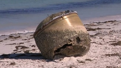 A cylindrical object is seen on beach in Green Head, Australia, July 17, 2023. (AP) A cylindrical object is seen on beach in Green Head, Australia, July 17, 2023. (AP)