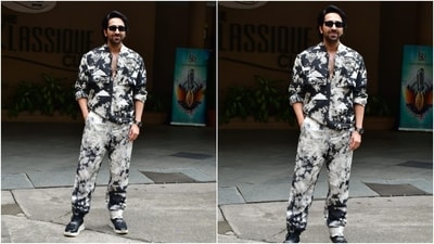 Ayushmann styled the shirt with matching pants featuring a mid-rise waist, a relaxed silhouette, side pockets, and folded hem. He accessorised the ensemble with a sleek black watch, high-ankle monochrome sneakers, and futuristic black-tinted sunglasses. Lastly, a side-parted hairdo and trimmed beard gave the finishing touch. (HT Photo/Varinder Chawla) Ayushmann styled the shirt with matching pants featuring a mid-rise waist, a relaxed silhouette, side pockets, and folded hem. He accessorised the ensemble with a sleek black watch, high-ankle monochrome sneakers, and futuristic black-tinted sunglasses. Lastly, a side-parted hairdo and trimmed beard gave the finishing touch. (HT Photo/Varinder Chawla)